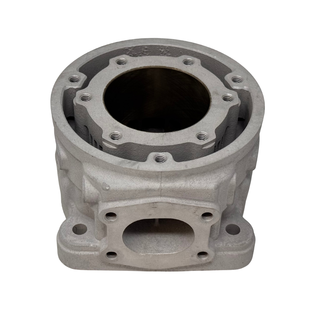 Metal engine cylinder block on a white background