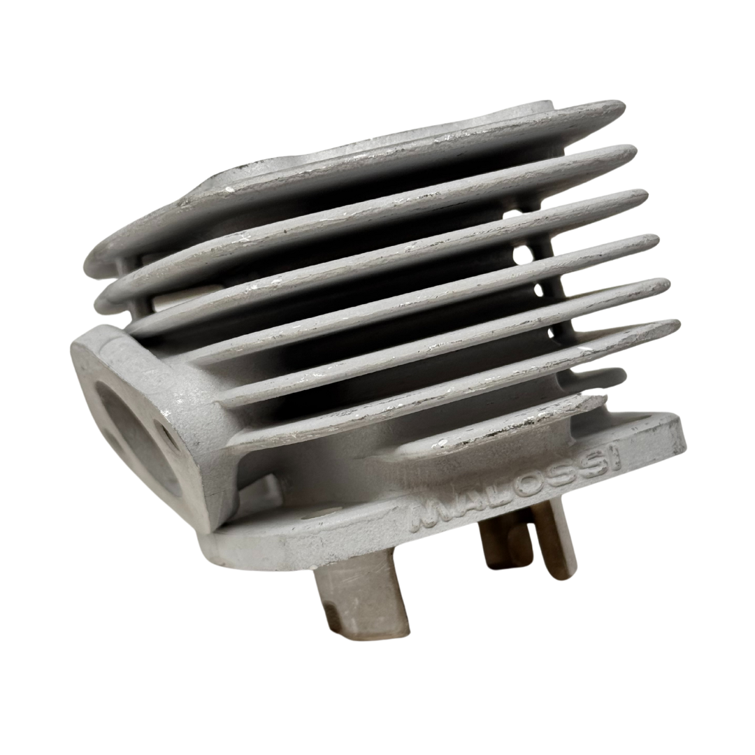 Metallic engine part with 'Malossi' branding on a white background