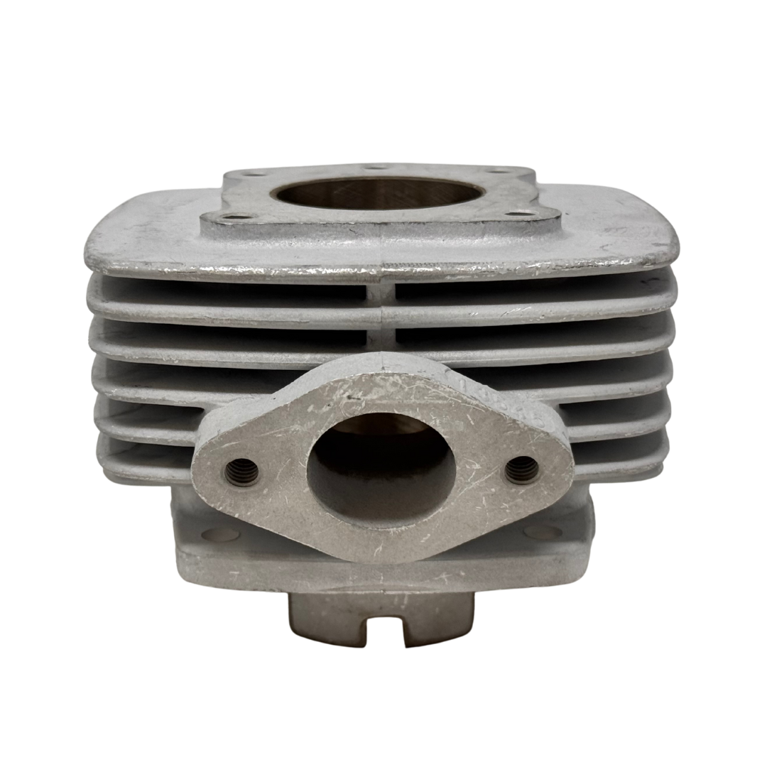 Metal engine cylinder head on a white background