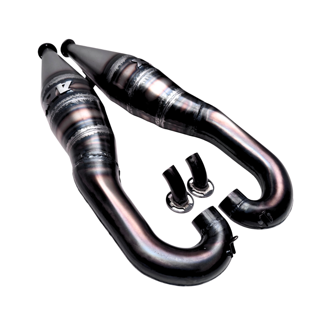 Metallic exhaust pipe system on a white background
