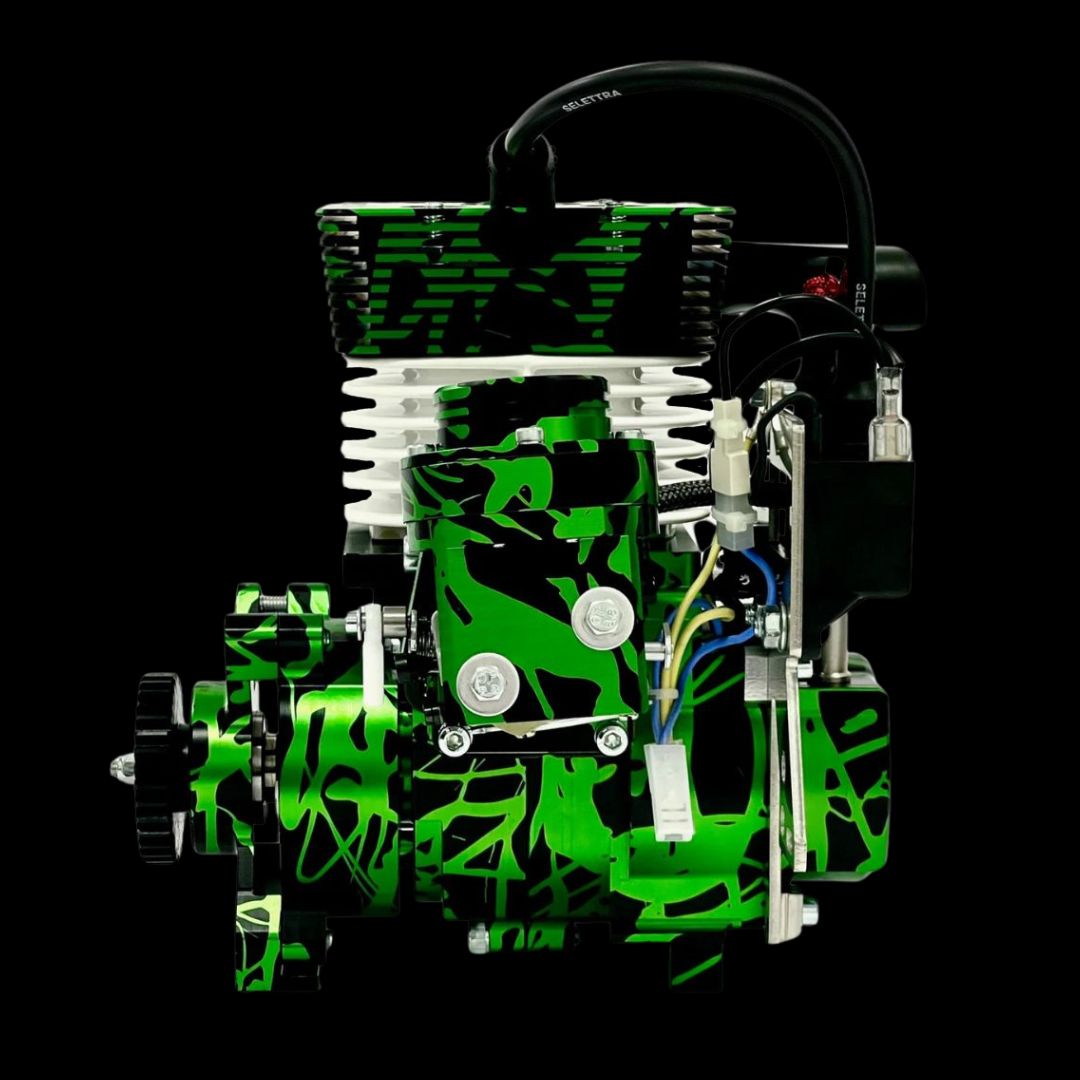 Green and black mechanical model on a black background