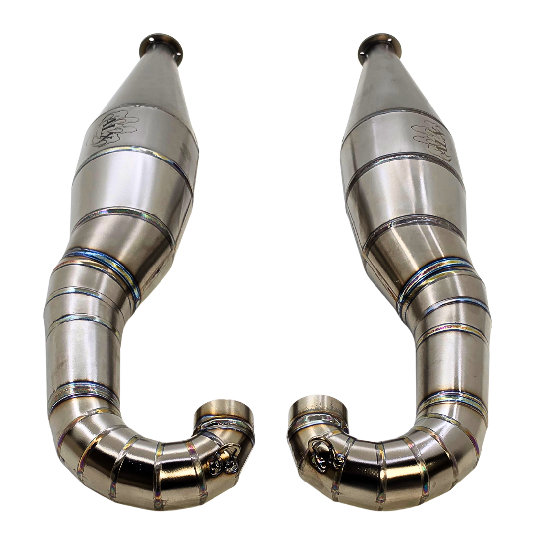 ALX titanium 80-100cc custom Baja twin exhaust pipes shown from the rear side with header bends