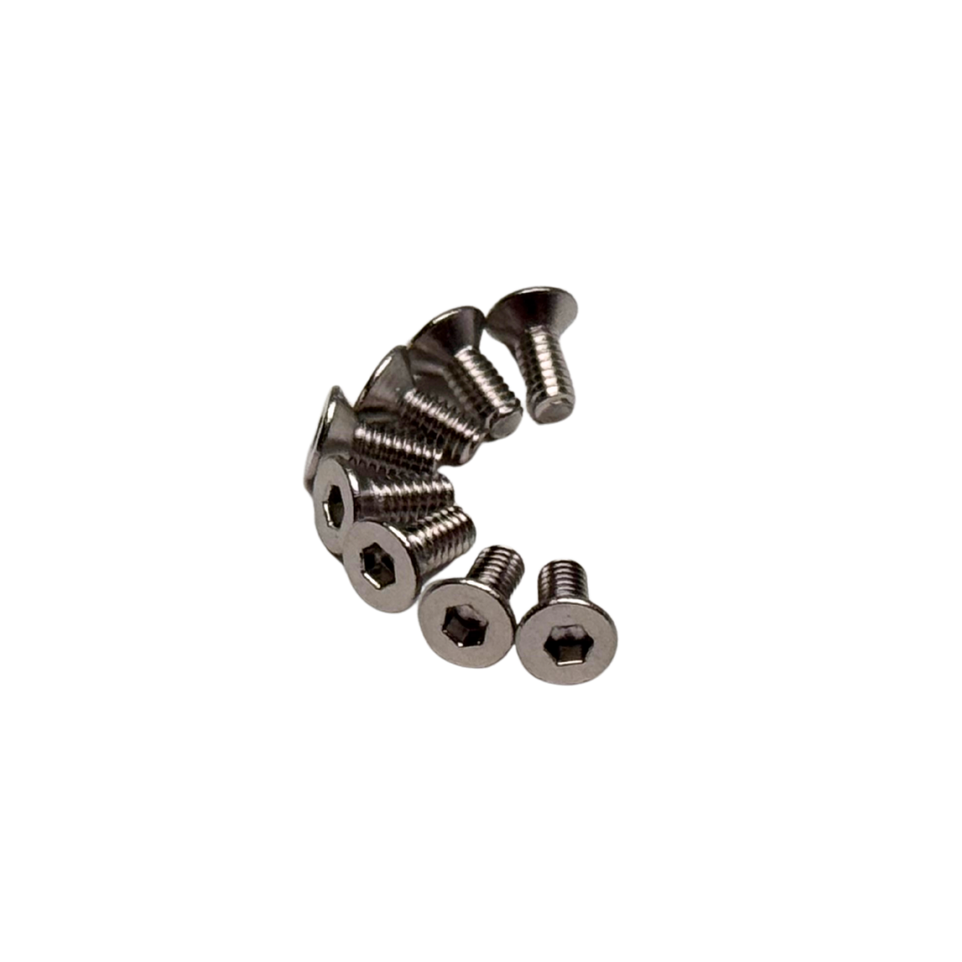 Set of metal screws on a white background