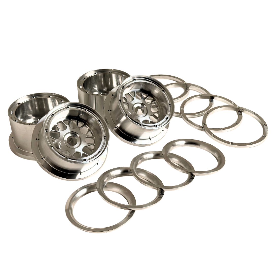 Beast RC Baja 5B complete billet wheel set with 8-piece beadlocks, angled view showing the wide 5B rear wheels with hidden-bolt beadlock rings