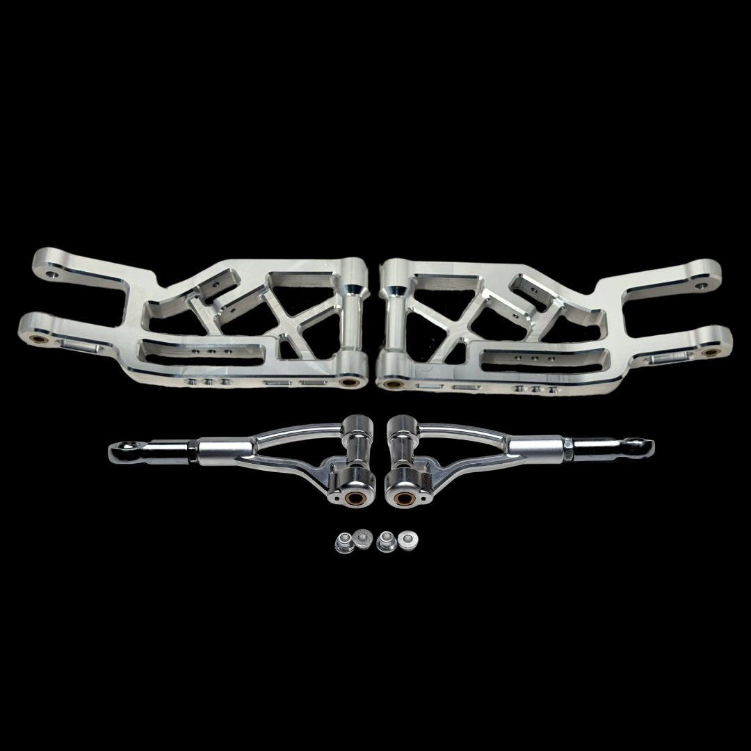 Set of metal suspension components on a black background