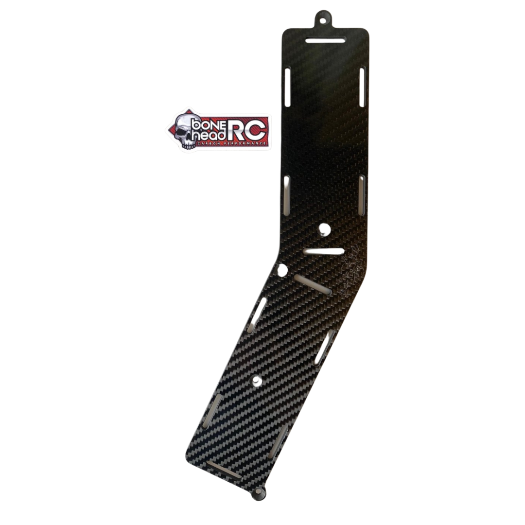 Carbon fiber winglet on a white background with a brand logo in the corner.