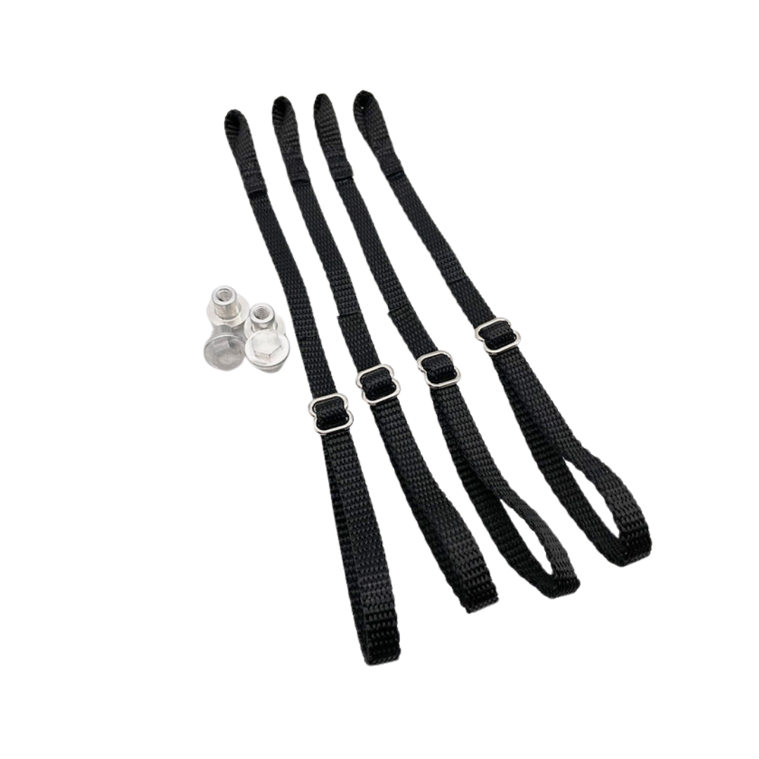 Set of black straps with silver clips on a white background