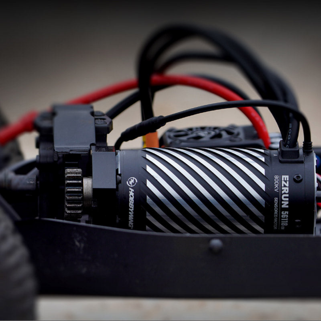 Close-up of a mechanical component with striped design and visible branding.