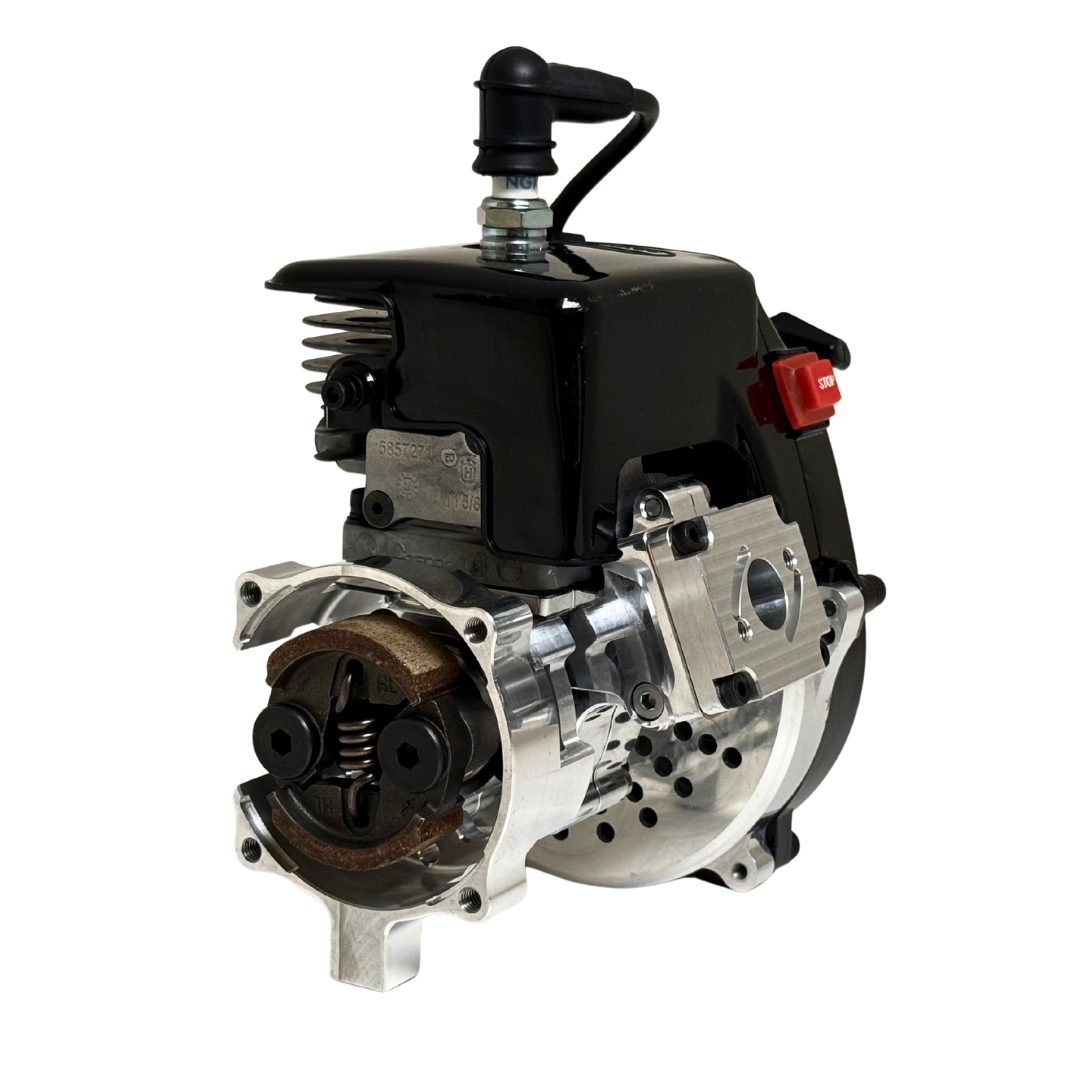 Front view of the HPRC 34cc race ported Zenoah engine from the opposite angle, showing the raw silver clutch bell, reed case mount and black cylinder head