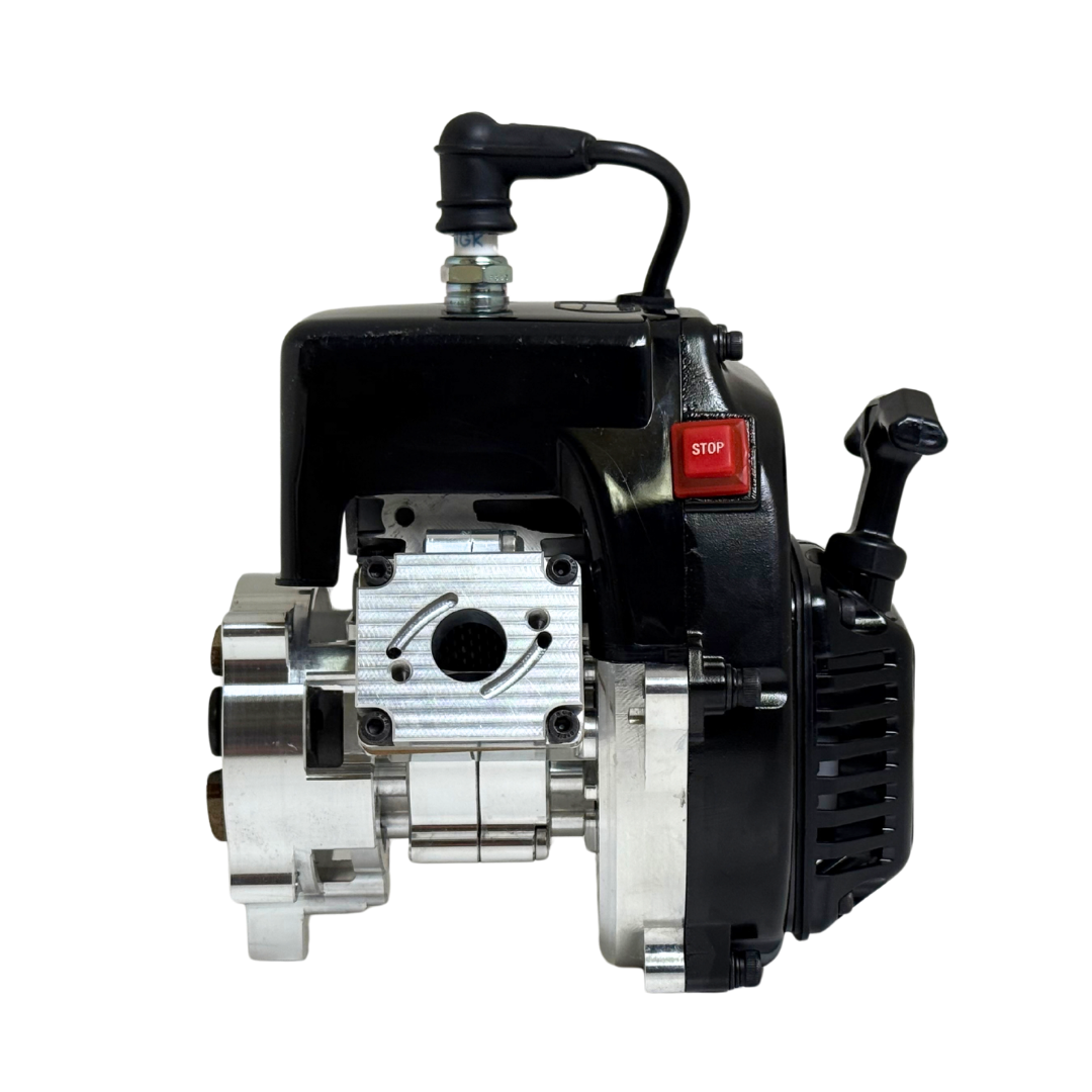 Straight-on side view of the HPRC 34cc race ported Zenoah engine showing the raw silver reed case plate, billet clutch bell edge and red stop switch