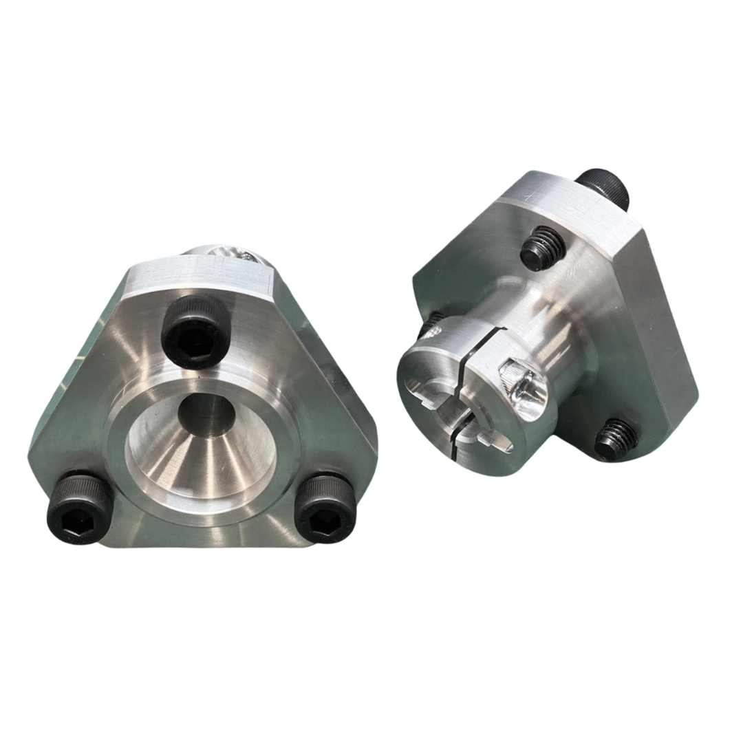 Two metal cylindrical components on a white background