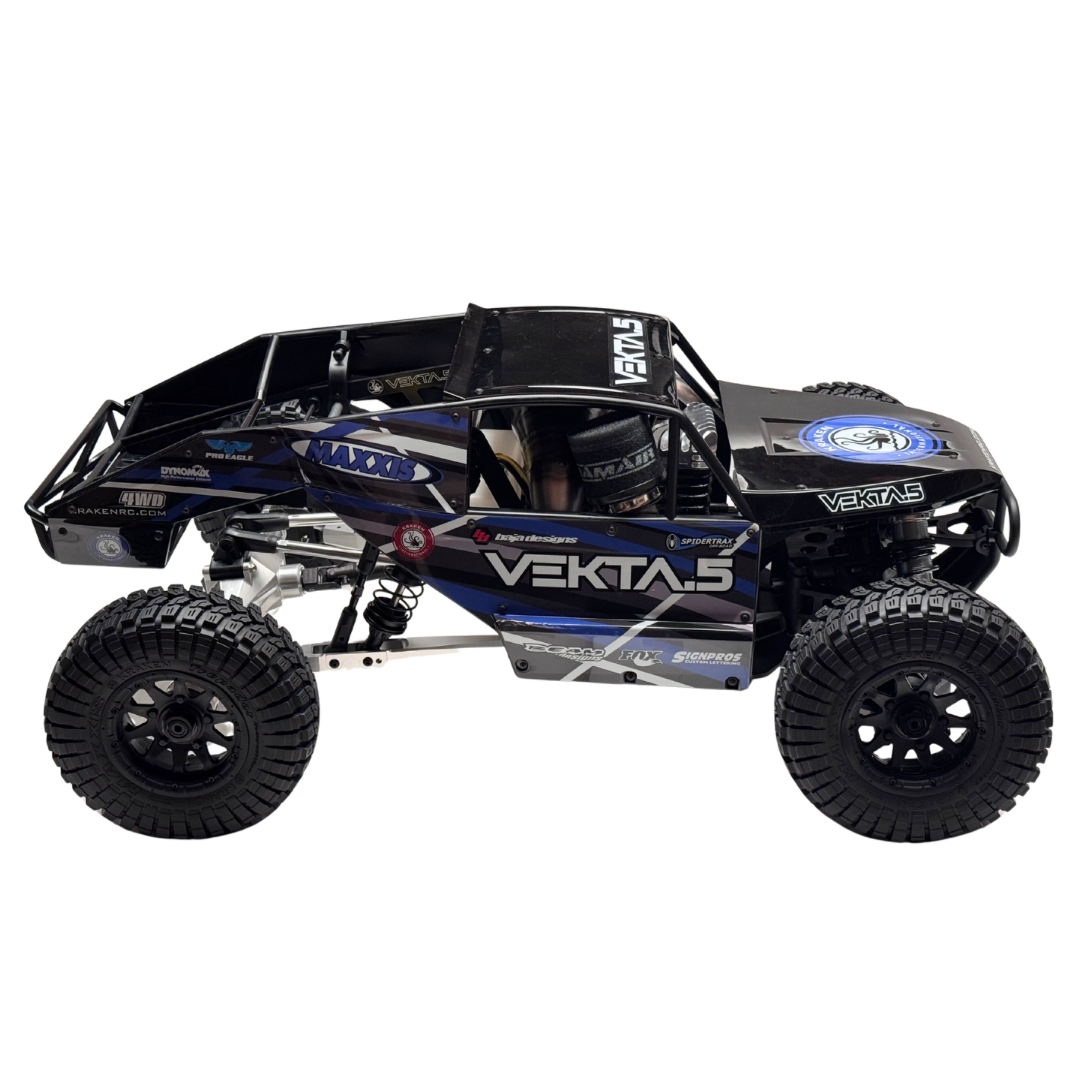 Black and blue off-road vehicle with 'Vektas' branding on a white background