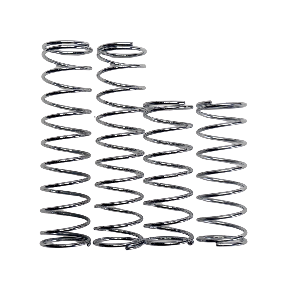 Set of four metal springs on a white background
