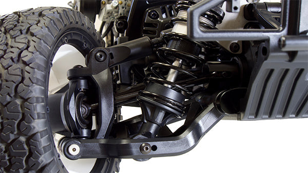 Close-up of a vehicle suspension system with tire