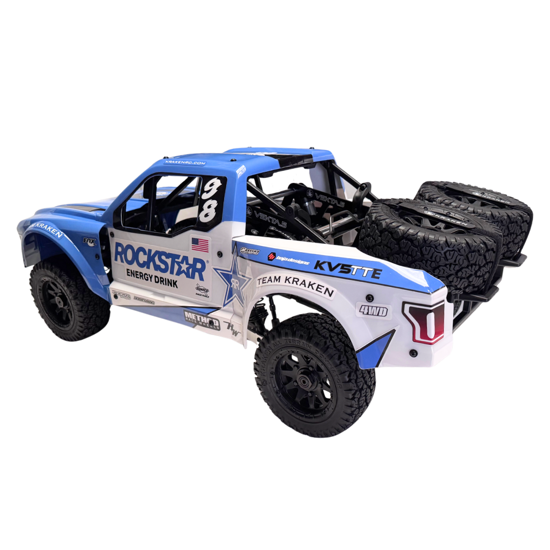Model off-road truck with sponsor logos on a white background