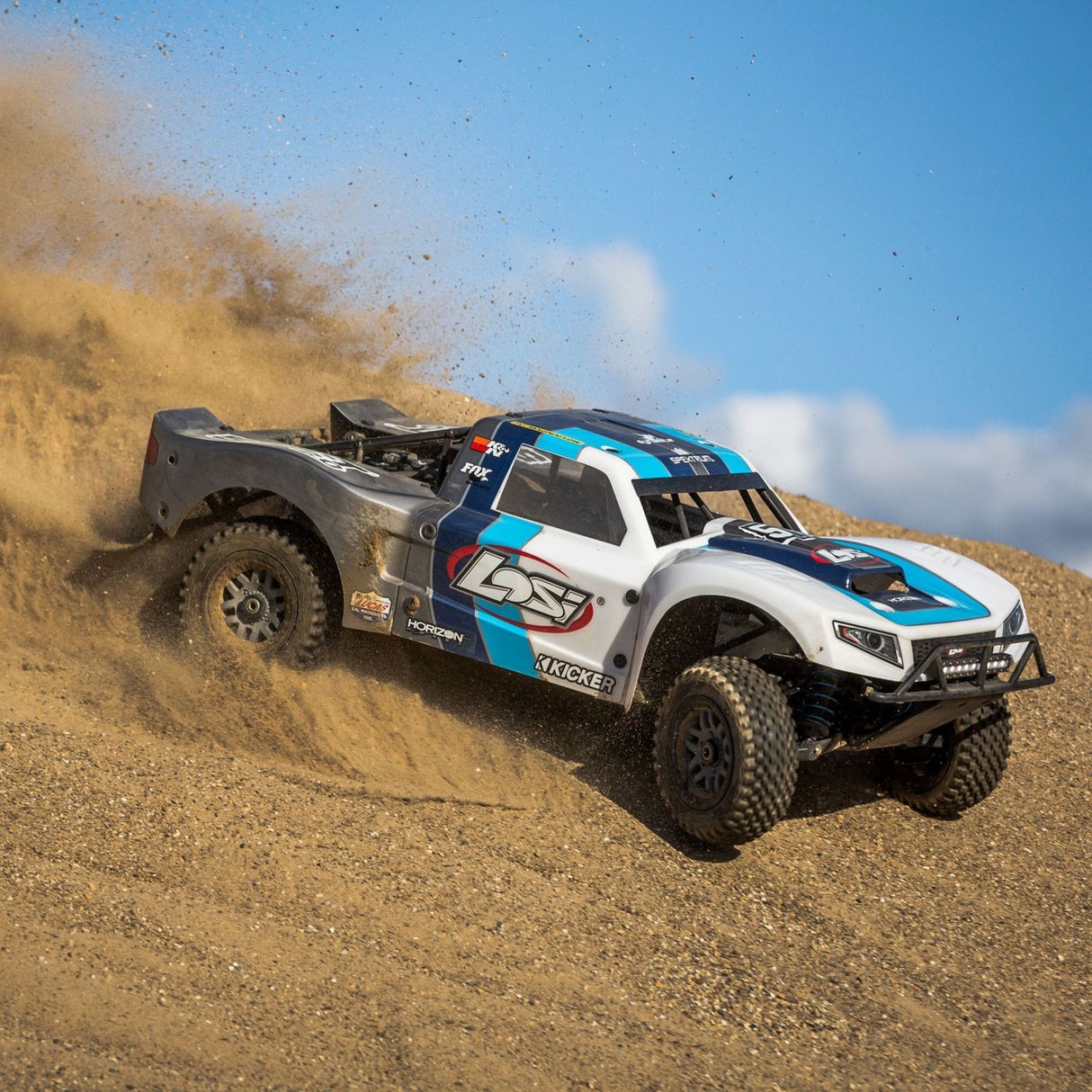 Losi 5IVE-T being driven in the dirt