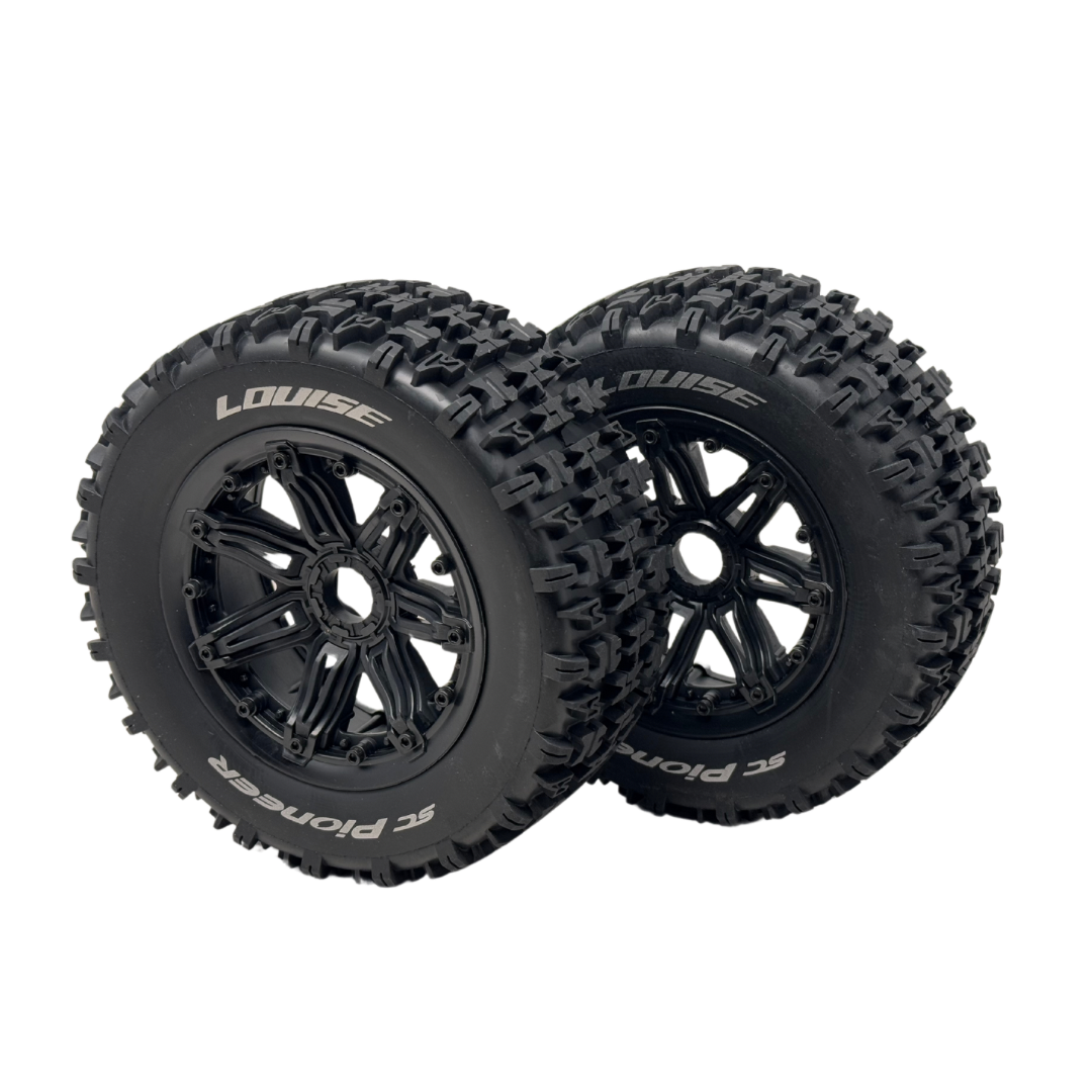 Two black off-road tires with visible branding on a white background