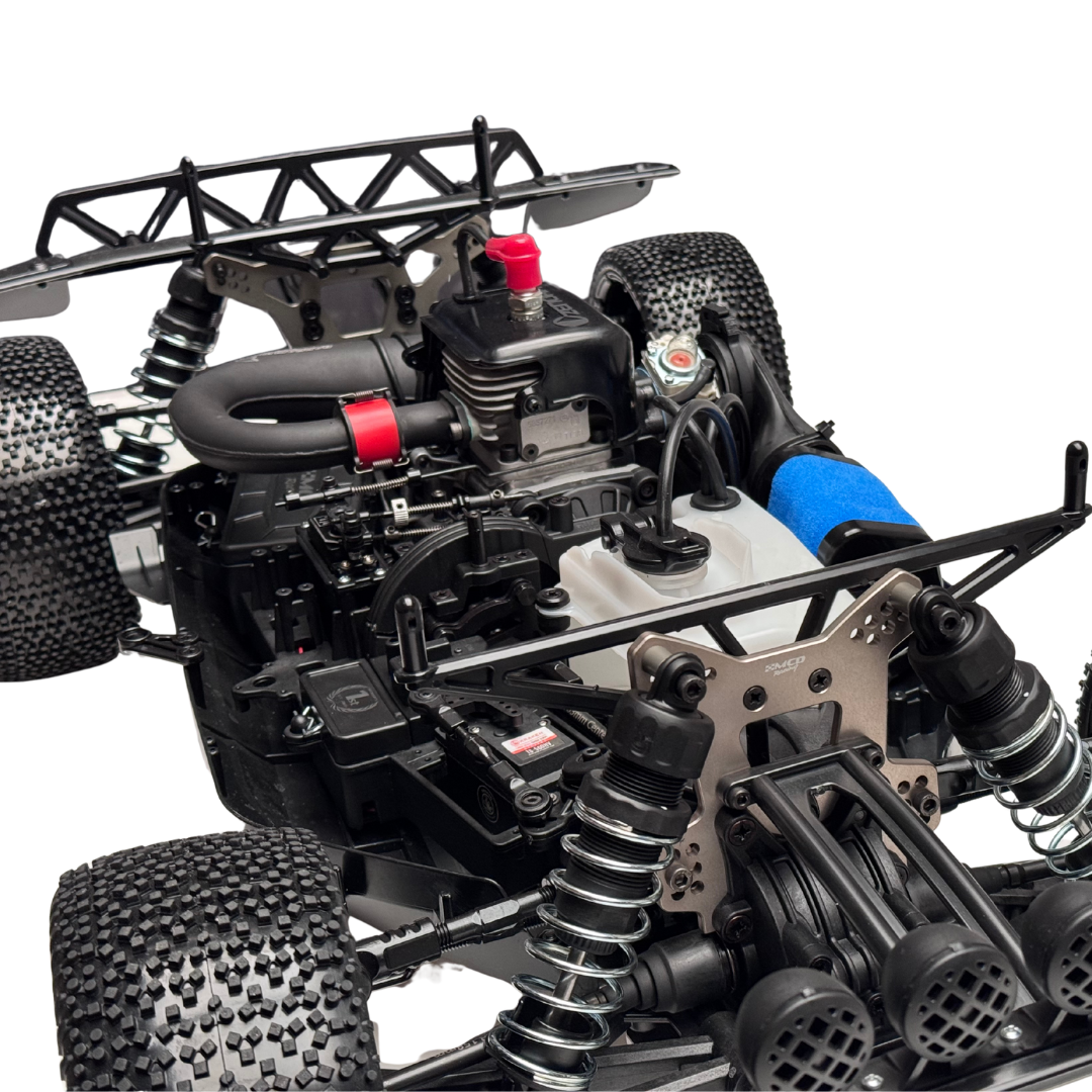 Close-up of a detailed RC car chassis with components on a white background