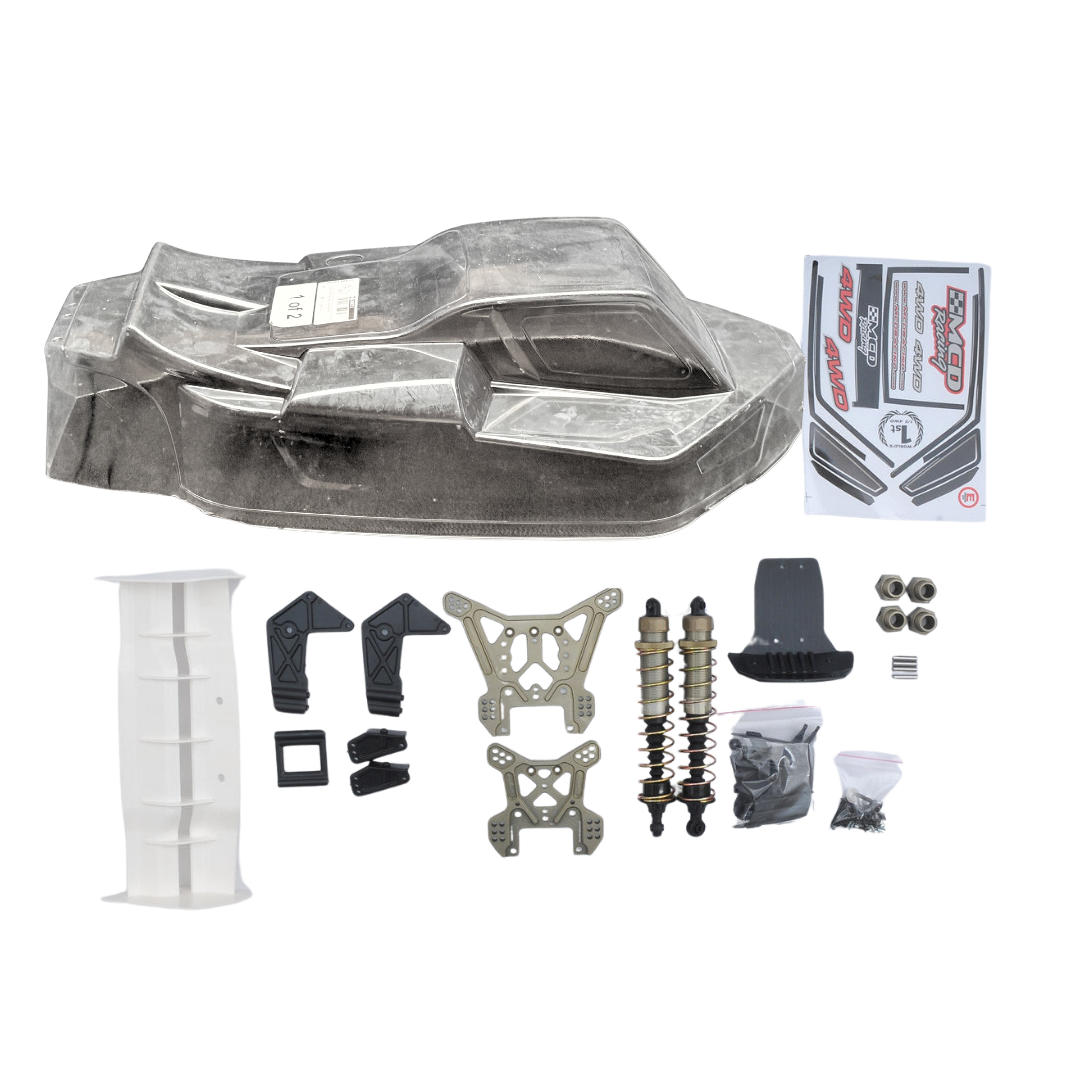 Collection of RC car parts including a body shell, suspension components, and a box on a white background.