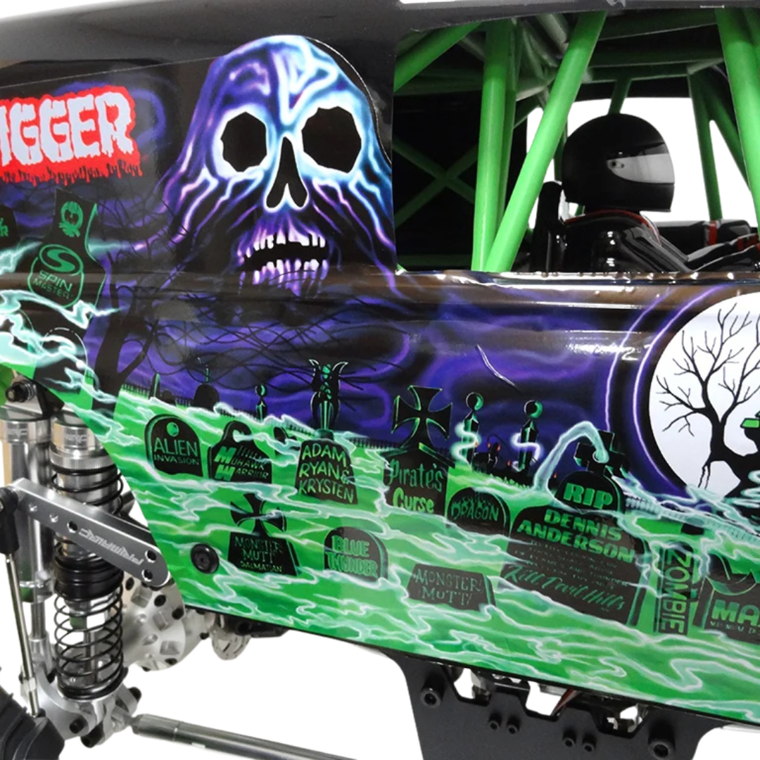 Close-up of a decorated vehicle with a skeleton design and various graphics.