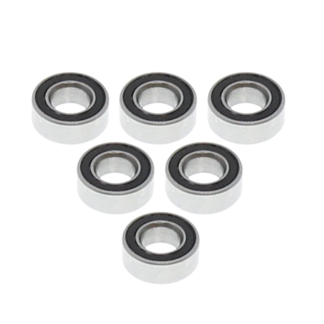 Set of six metal bearings on a white background