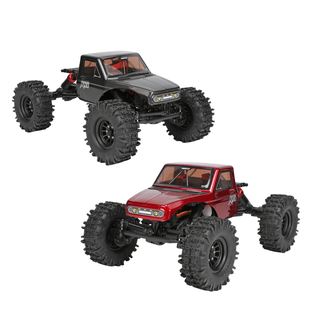 Two remote control monster trucks, one red and one black, on a white background.