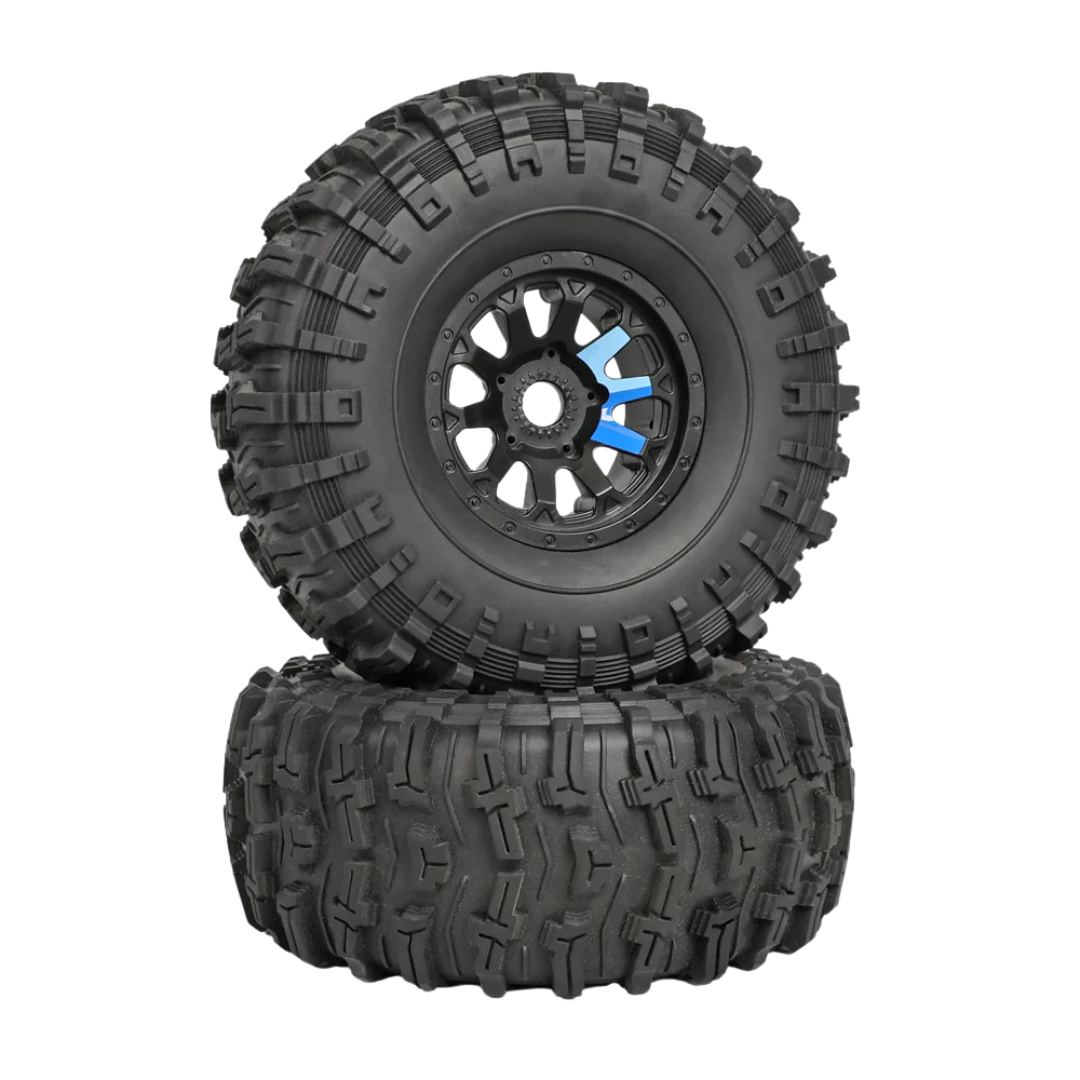 Two black off-road tires with tread patterns on a white background