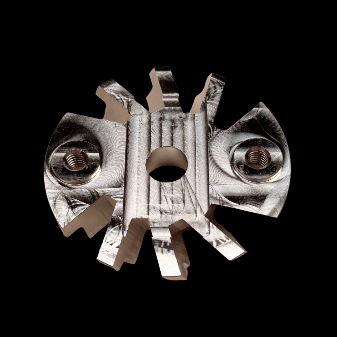 A silver-colored metal cooling backplate for a Taylor 70cc Twin engine with a 62mm V3 clutch.