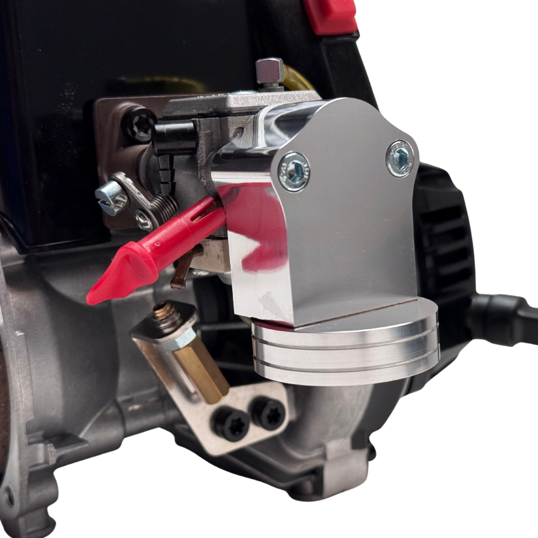 Close-up of a mechanical component with red and black parts on a white background