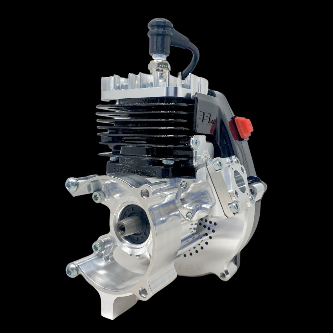 A silver billet reed engine, predominantly used in remote control vehicles, showcasing its intricate design and components.