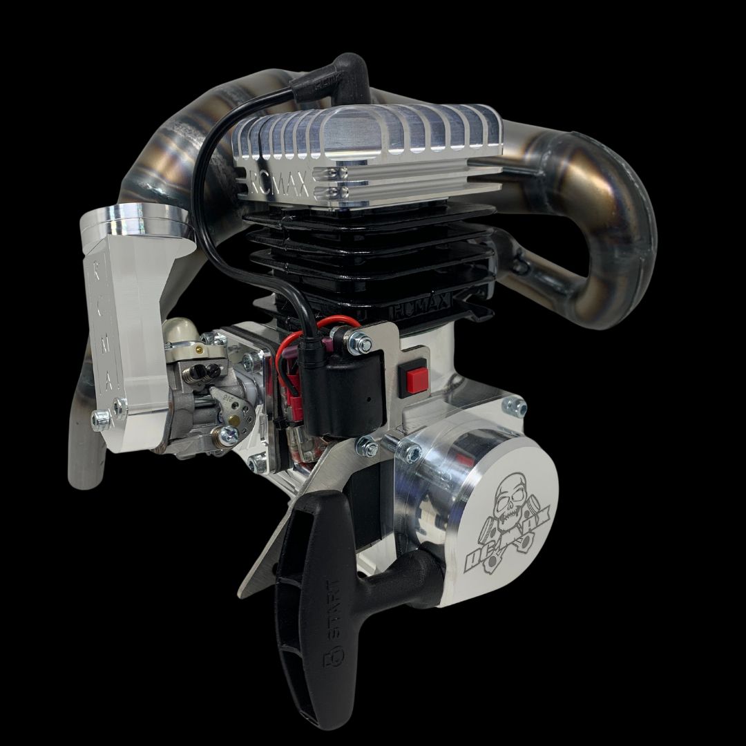 A TAYLOR 40GT V2 VEKTA/KV5TT Package big bore billet reed engine with visible customizations and modifications, including a billet intake system and a clutch system.
