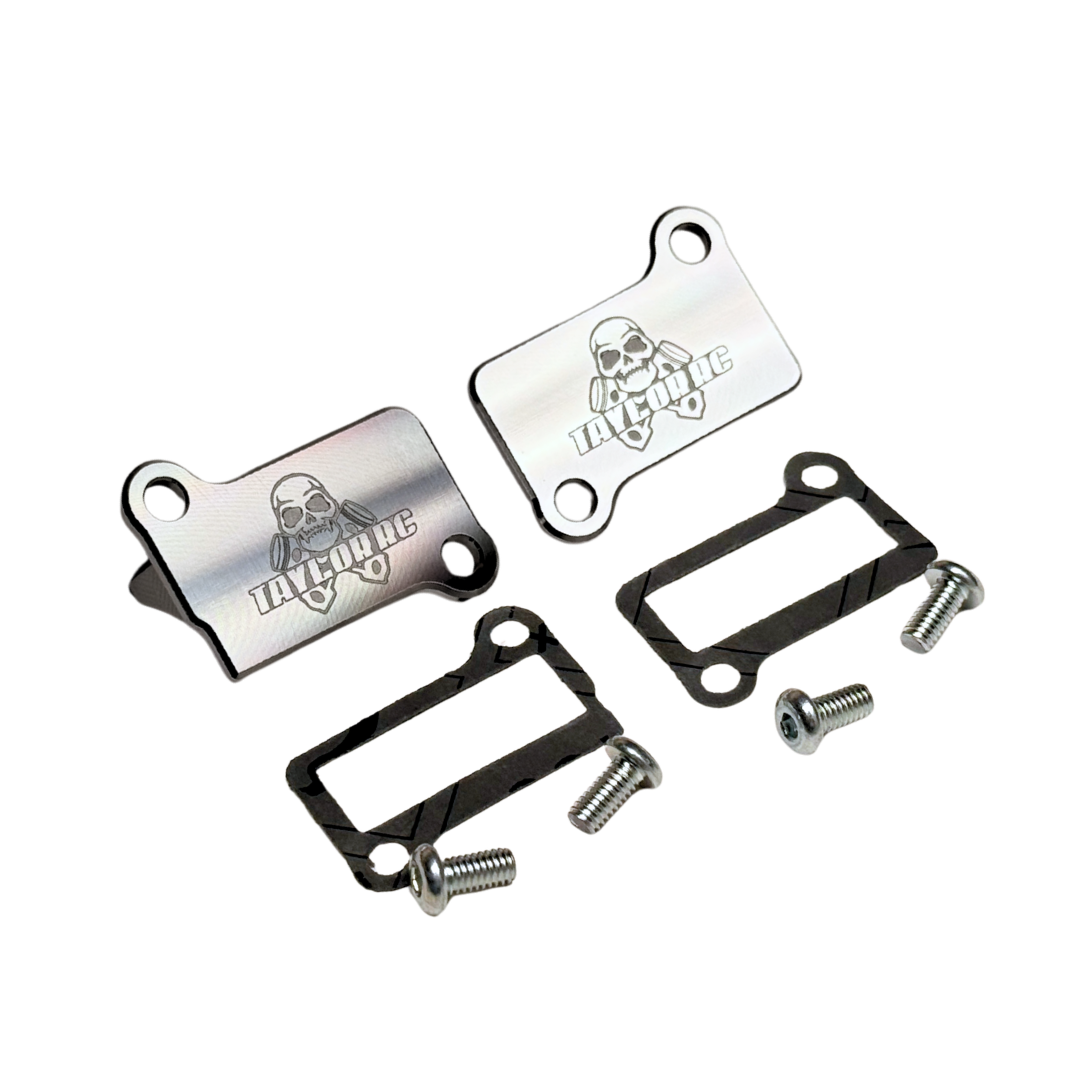 Taylor RC billet CNC ported Zenoah G320 & Fujiwara 350RC transfer covers in raw silver, angled view of the Taylor RC branded face with gaskets and mounting screws