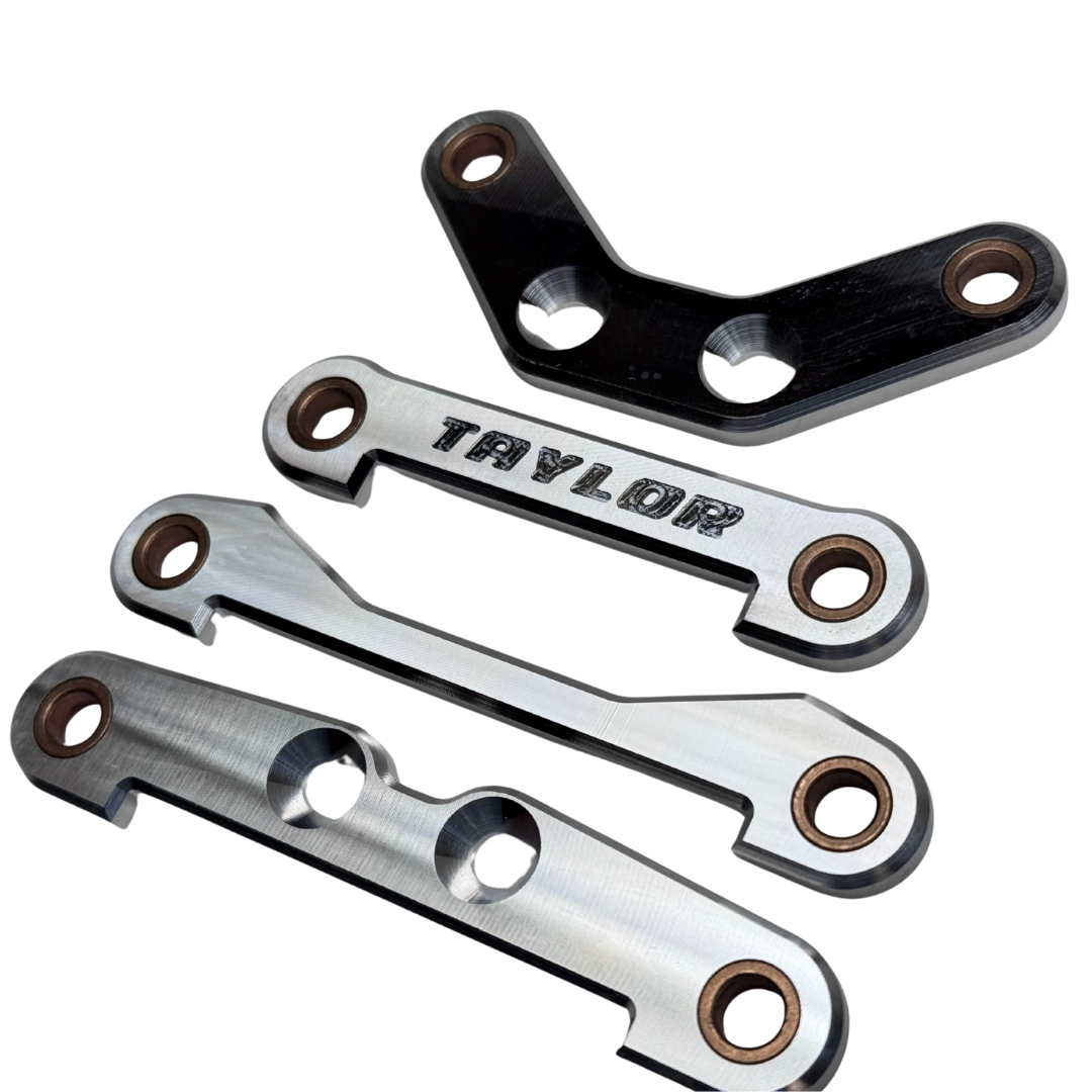 Metal components with 'Taylor' branding on a white background