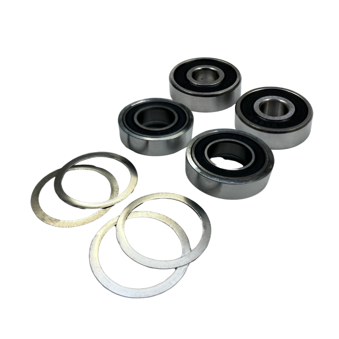 Taylor RC Losi 5ive diff housing complete bearing rebuild kit, angled view showing four sealed bearings and four shims