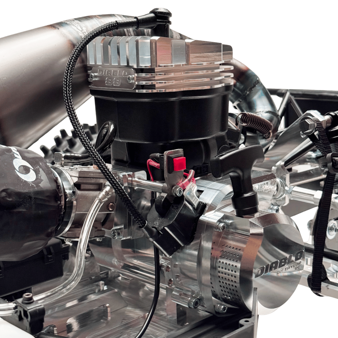 Close-up of a mechanical engine component with visible branding on a green background