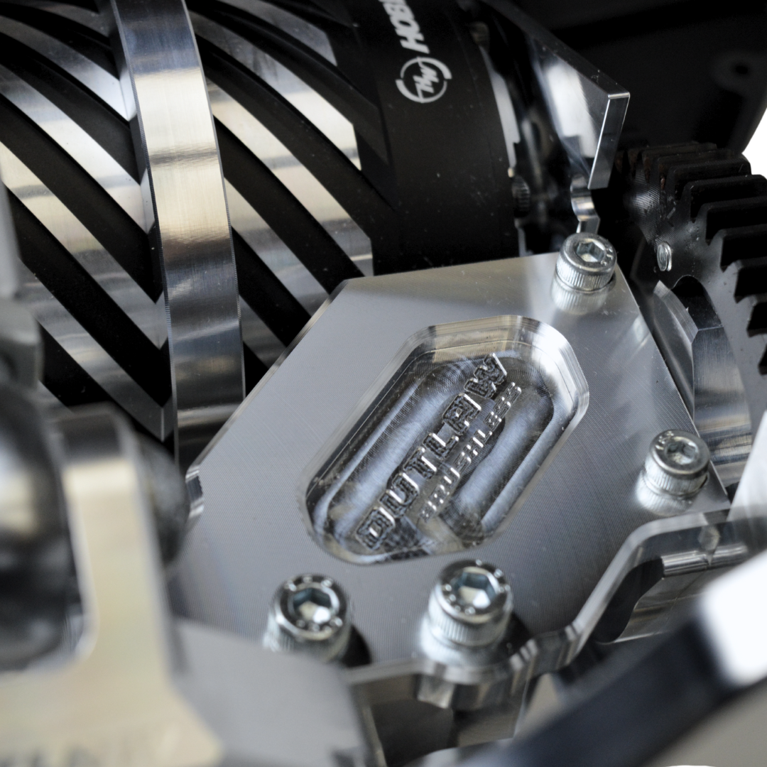 Close-up of a mechanical component with gears and metal parts.