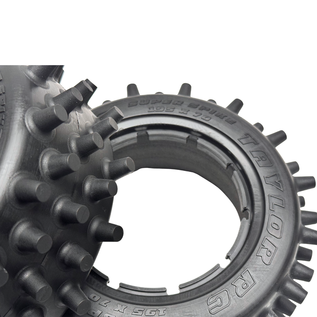 Close-up of a Taylor RC tire with tread pattern on a white background