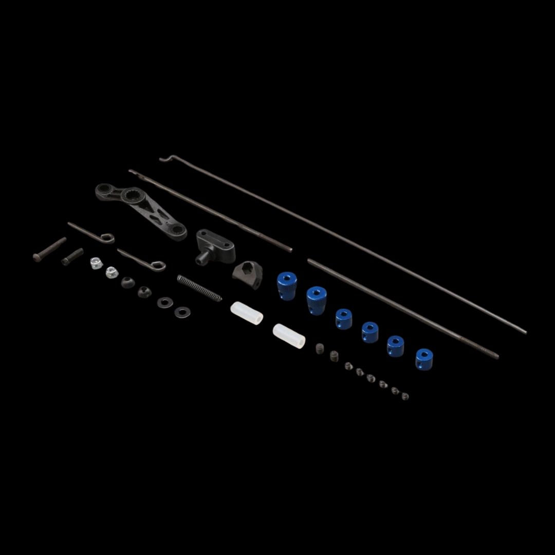 A set of various metal components and linkage for a Losi 5IVE-T