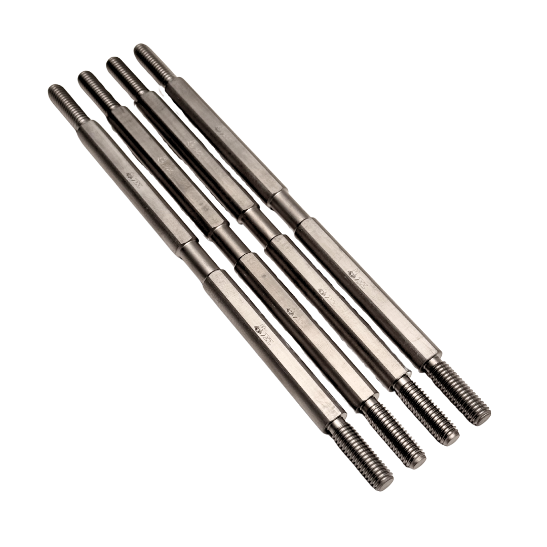 Set of metal rods with threaded ends on a white background