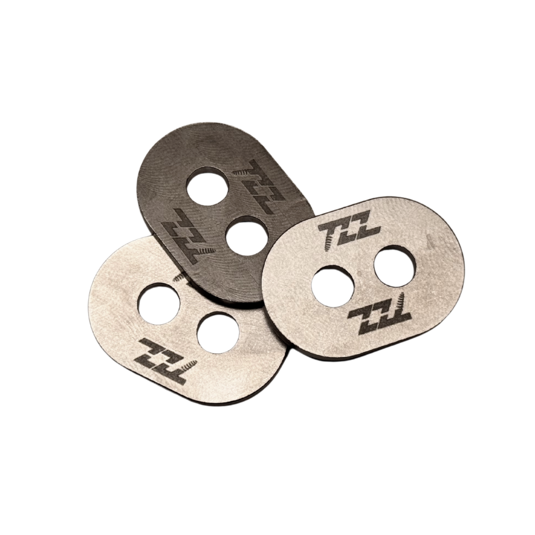 Three metal washers with 'TZZ' branding on a white background