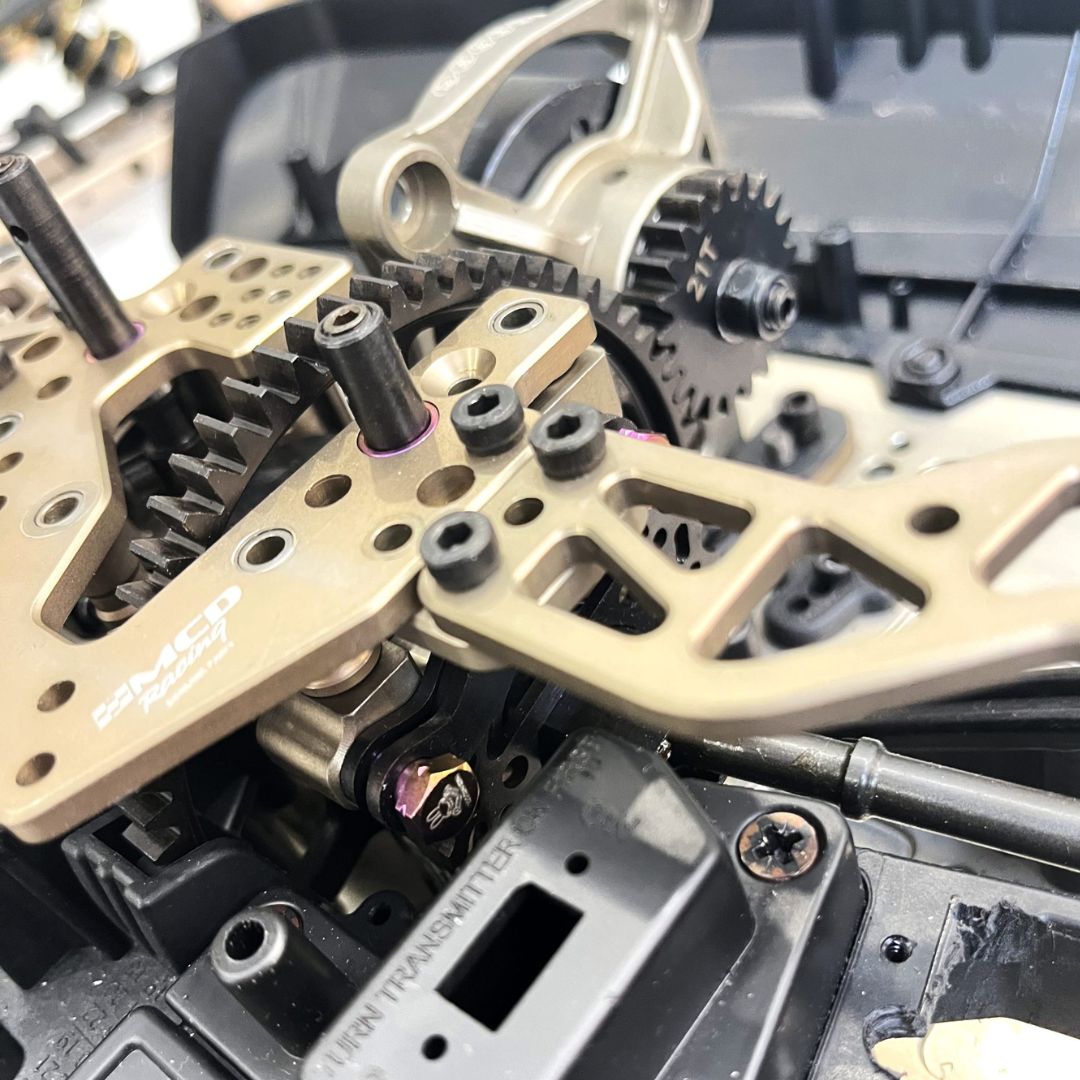 Close-up of mechanical components with gears and metal parts.