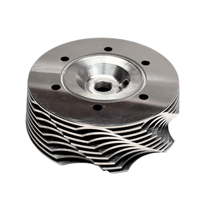 Metal engine cylinder head on a white background