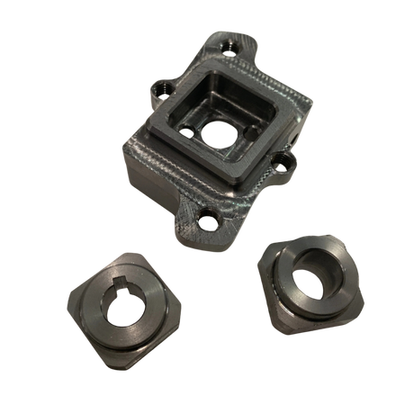 Three metal clutch components on a white background
