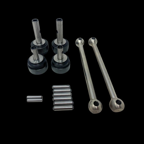 A set of metal dogbone kit parts for a remote control toy, including shafts and pins, displayed on a clear surface.