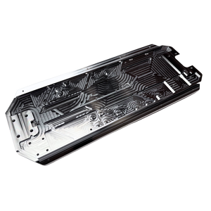 Taylor RC OUTLAW V4 main chassis plate in raw silver, angled view from the rear showing the pocketed top face and stepped mounting cutout
