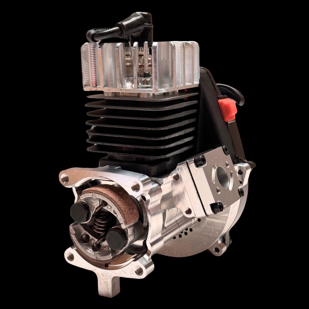 A Beast RC 34cc Billet Case Reed Engine, featuring a black and silver color scheme with visible gears and wiring.