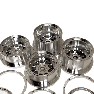 Beast RC Baja 5B complete billet wheel set with 8-piece beadlocks, close-up view of the wide 5B rear wheels and hidden-bolt beadlock rings