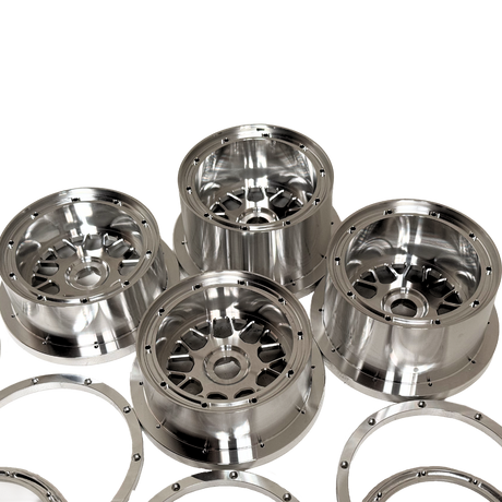 Beast RC Baja 5B complete billet wheel set with 8-piece beadlocks, close-up view of the wide 5B rear wheels and hidden-bolt beadlock rings