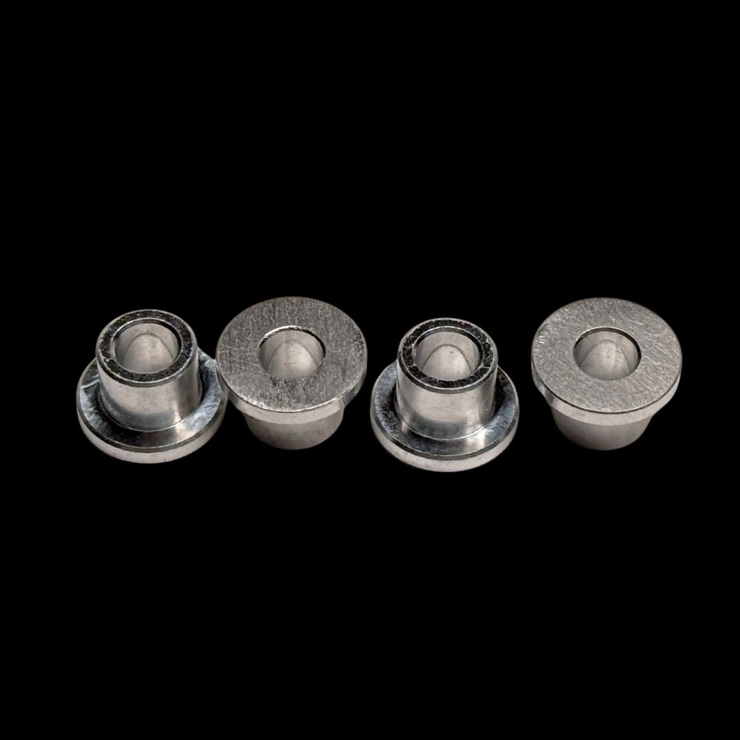 Four metallic buttons on a black background
