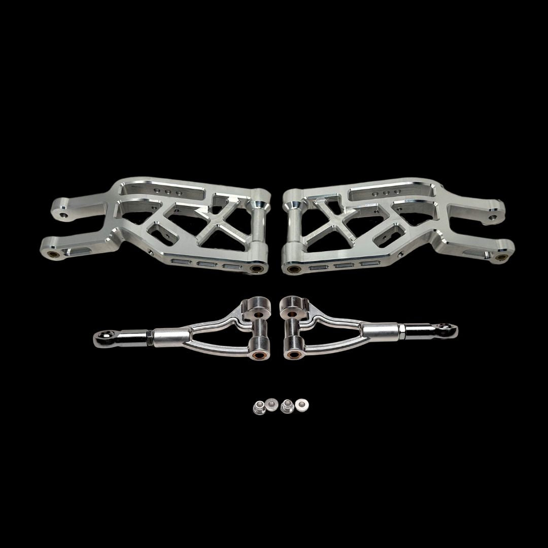 Set of metal suspension components on a black background